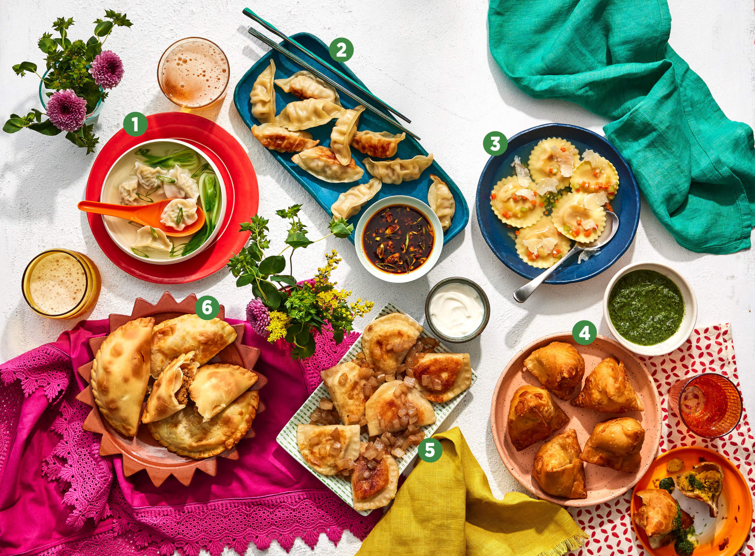 Overhead photo of a table with 6 different types of dumplings