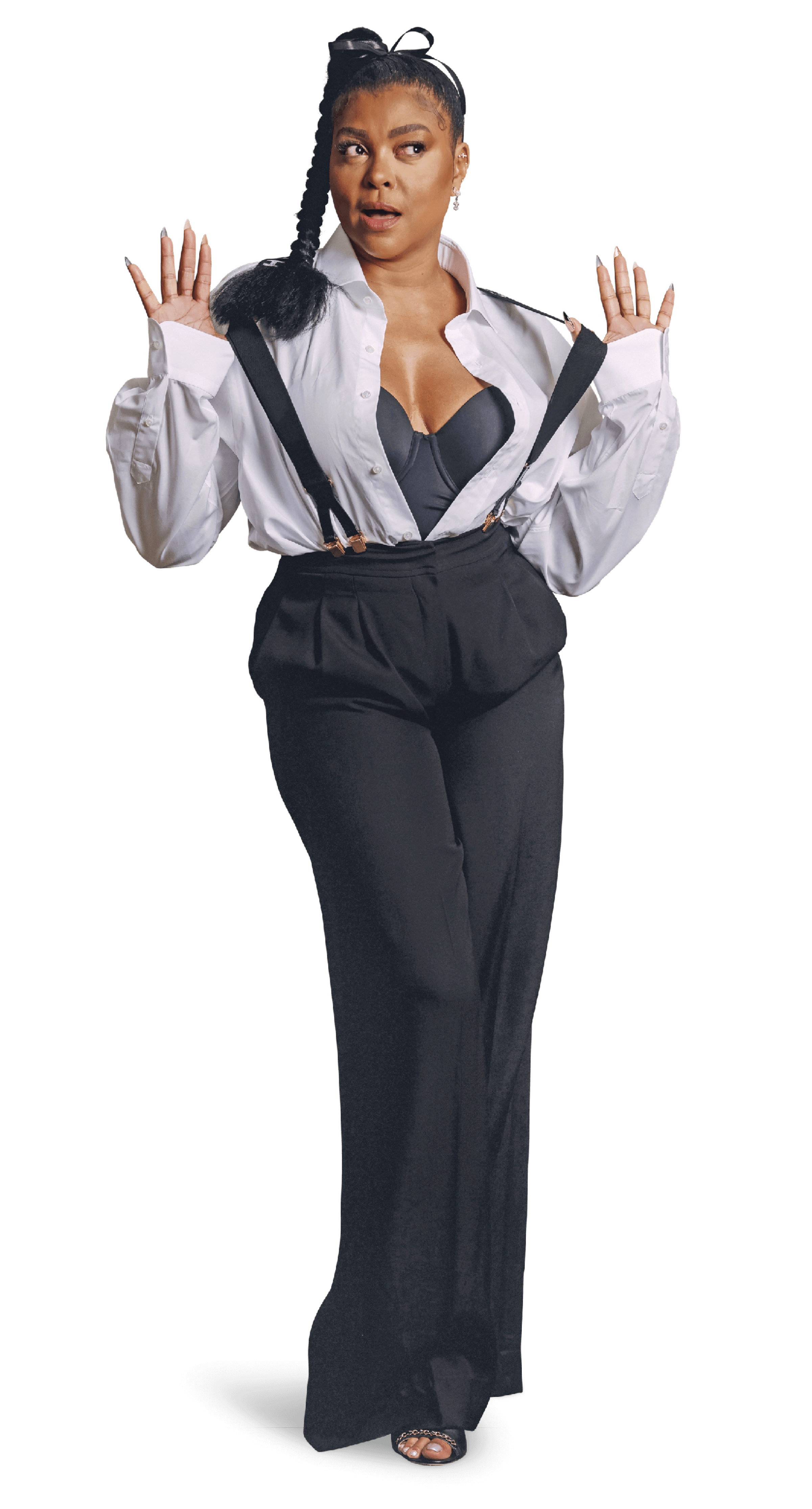 Photo of Taraji P. Henson in a white shirt, black pants, and suspenders