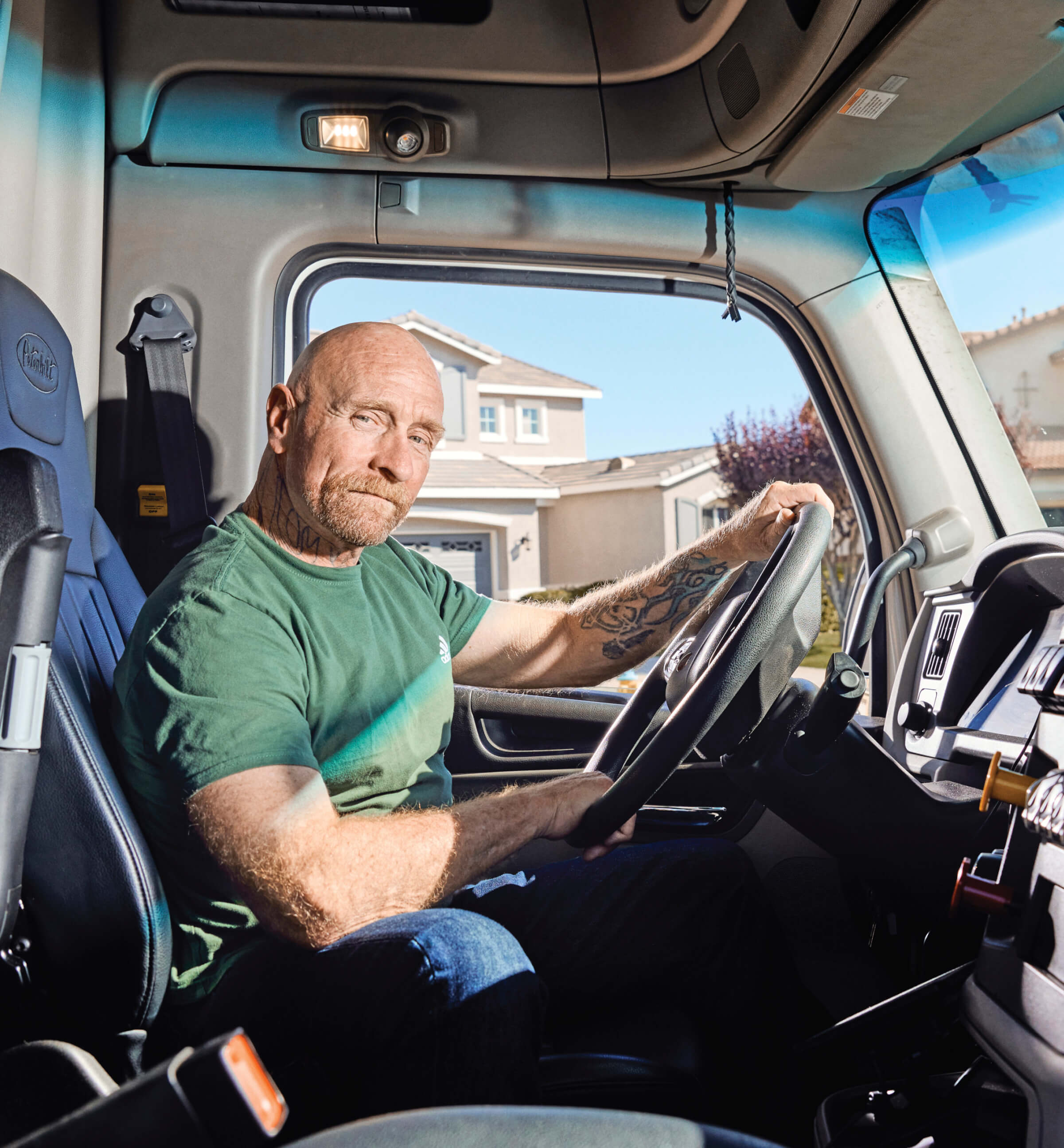 Photo of Ronald Nessman driving a truck