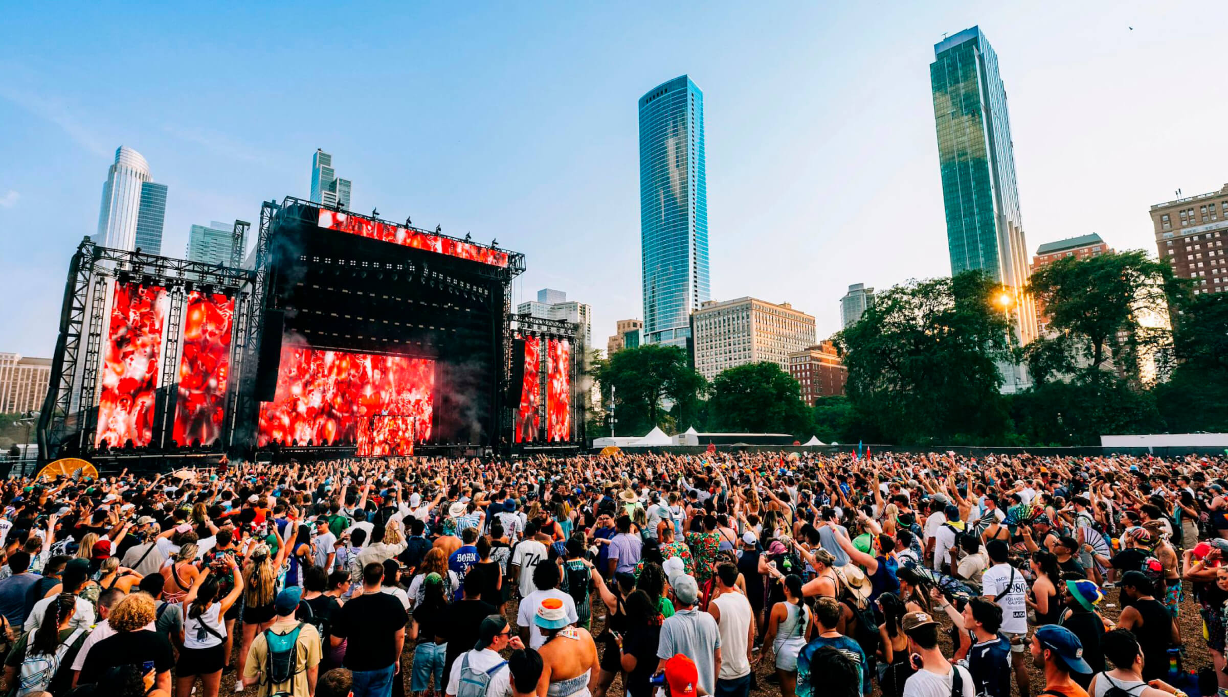 Photo of crowd in front of large stage at Lollapalooza