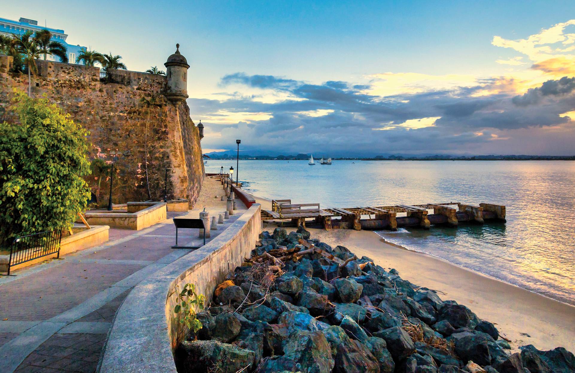 Image of the the shoreline of San Juan with a pathway leading into the beach