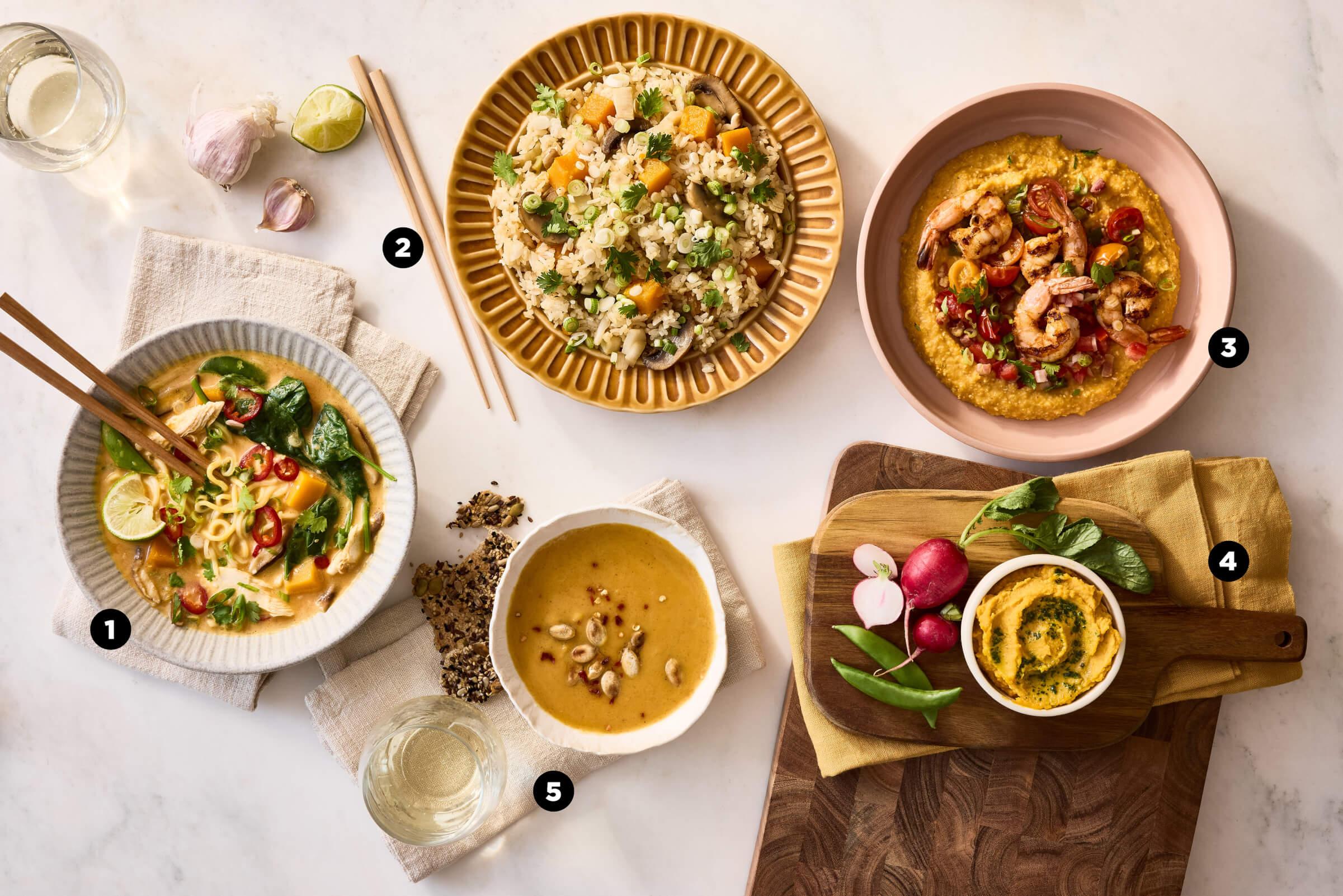 Overhead photo of colorful food spread on table