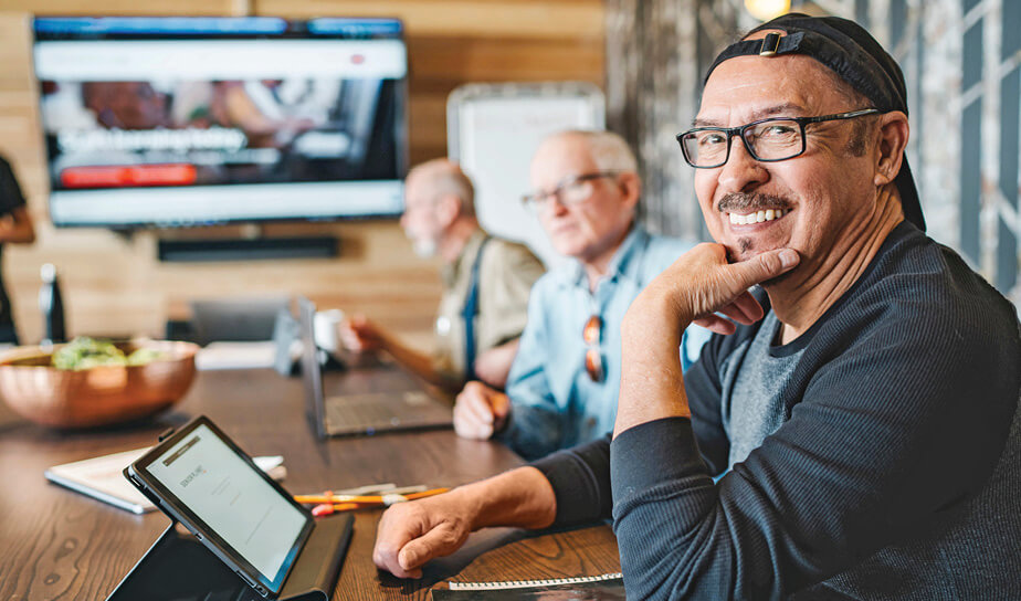 Photo of older adult using a laptop