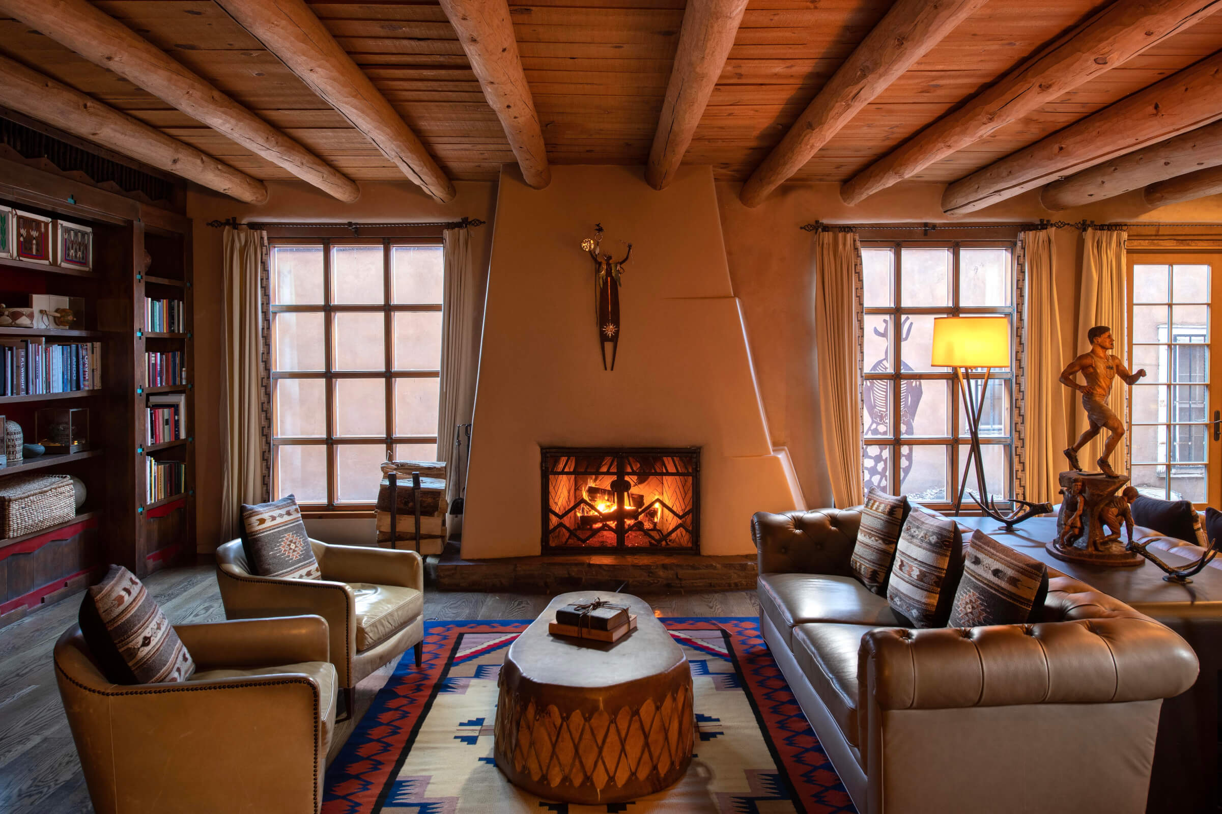 Photo of a cozy room with a fireplace at Rosewood Inn of the Anasazi