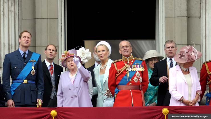 The British Royal Family including Prince William (L) Camilla (R), The Duchess of Cornwall stand alongside Queen Elizabeth II (centre L) and her husband Prince Phillip, The Duke of Edinburgh, as they watch a flypast from the balcony of Buckingham Palace, June 12, 2010.