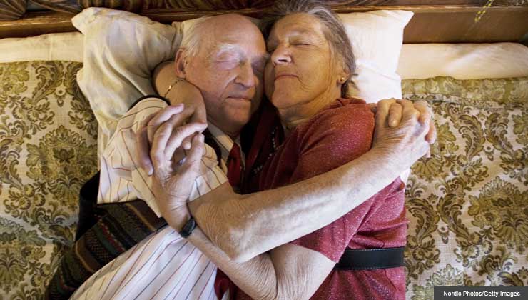sex after illness senior couple hugging 	