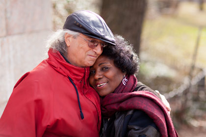 Chris and Minerva Warwin, an interracial couple, walk in Riverside Park in New York City.