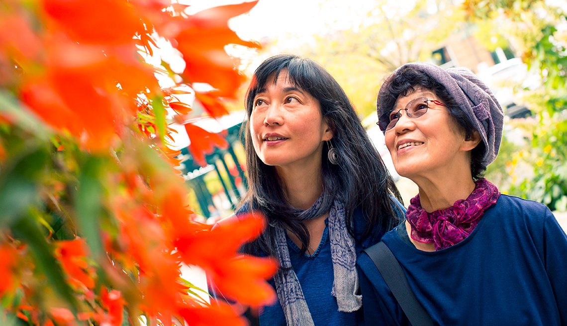 Asian mother and daughter, autumn leaves, Aging, AARP Research, Life, Leisure