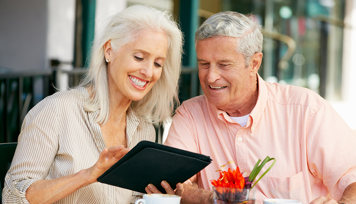 mature couple, tablet computer, outdoor cafe, Mobile technology, AARP Research, Technology
