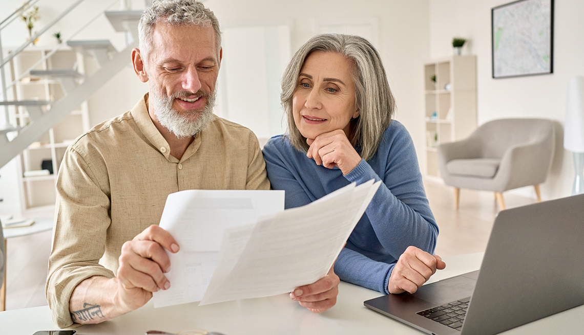 Senior Couple Reviewing Financial Document
