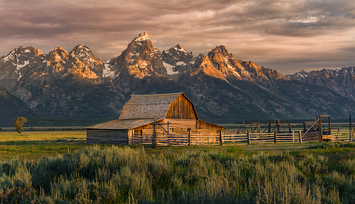 A barn and mountains in Jackson Wyoming