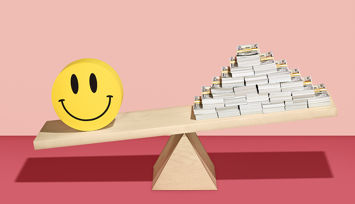 Ilustración de una balanza con una cara feliz a un lado y una pirámide de billetes al otro.