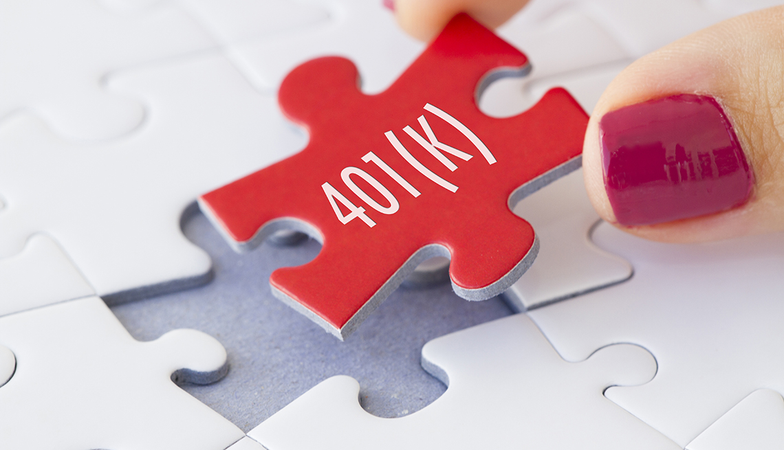 a red puzzle piece that says 401(k) being placed into a jigsaw puzzle