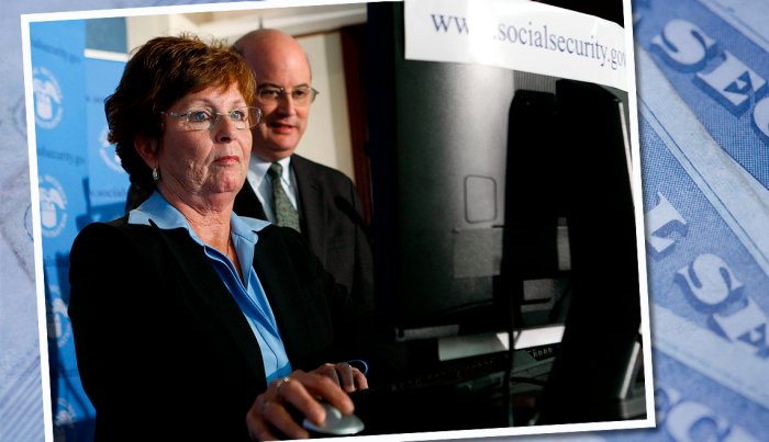 item 7 of Gallery image first baby boomer to file for social security does so on a computer while the commissioner watches 