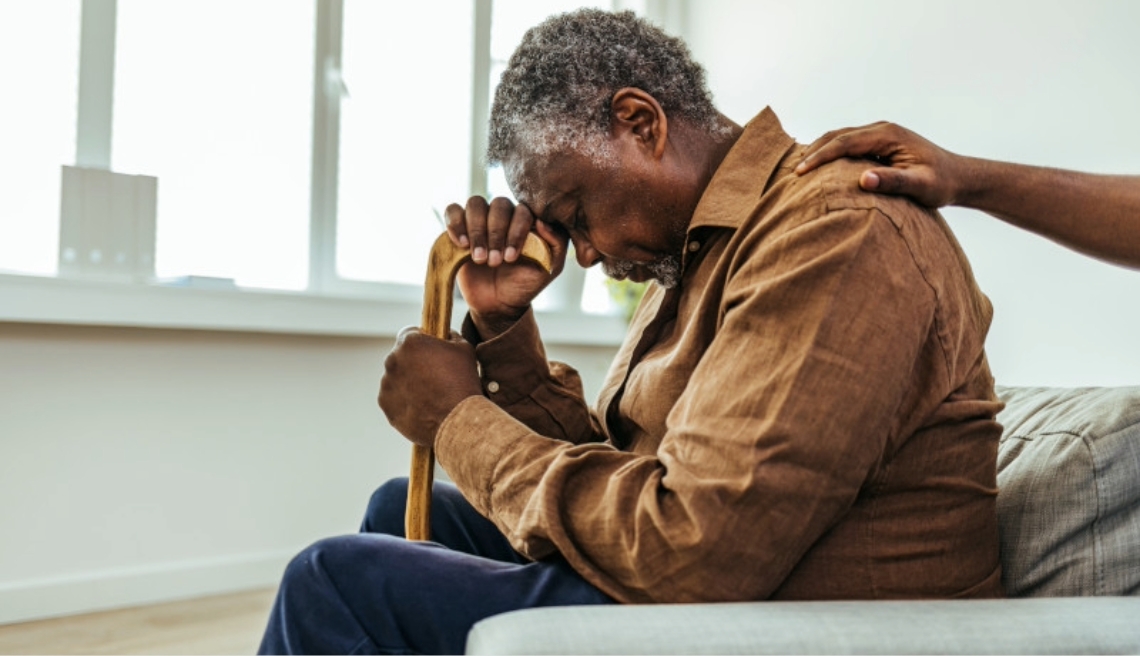 Worried man sitting on chair