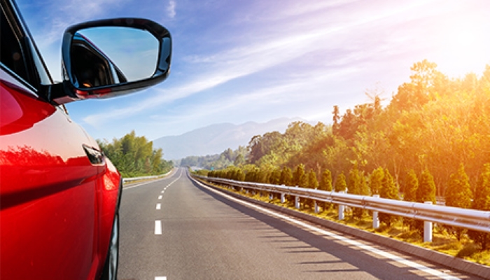Red Car on the Highway