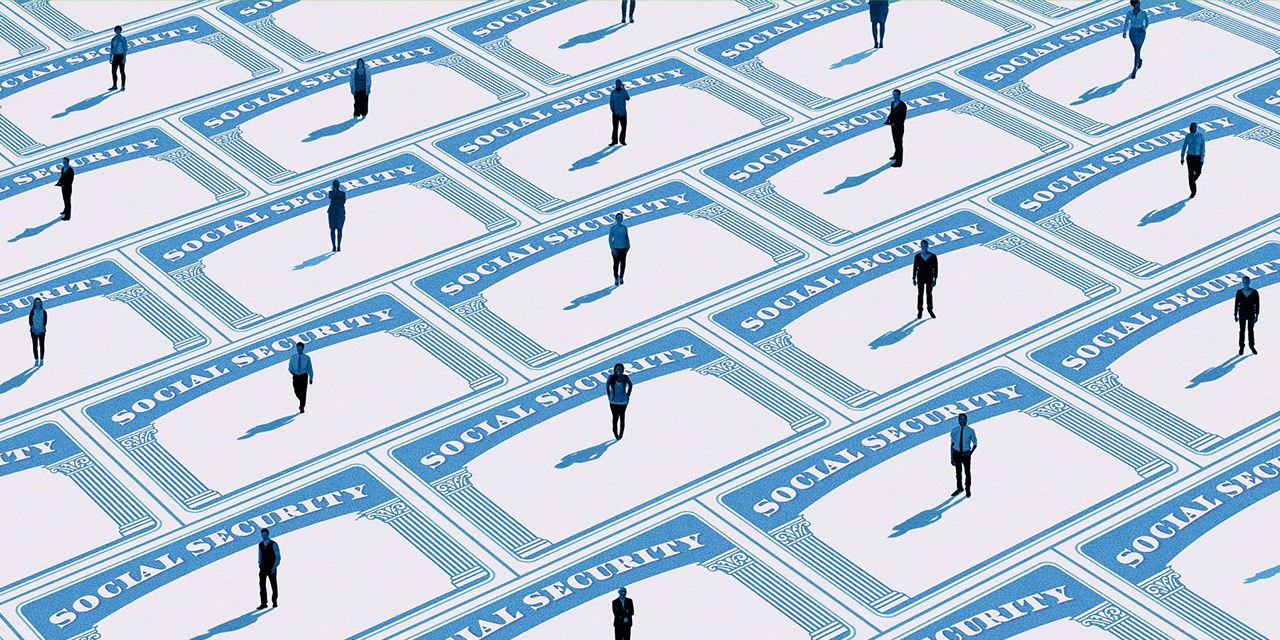 People standing on large Social Security cards.