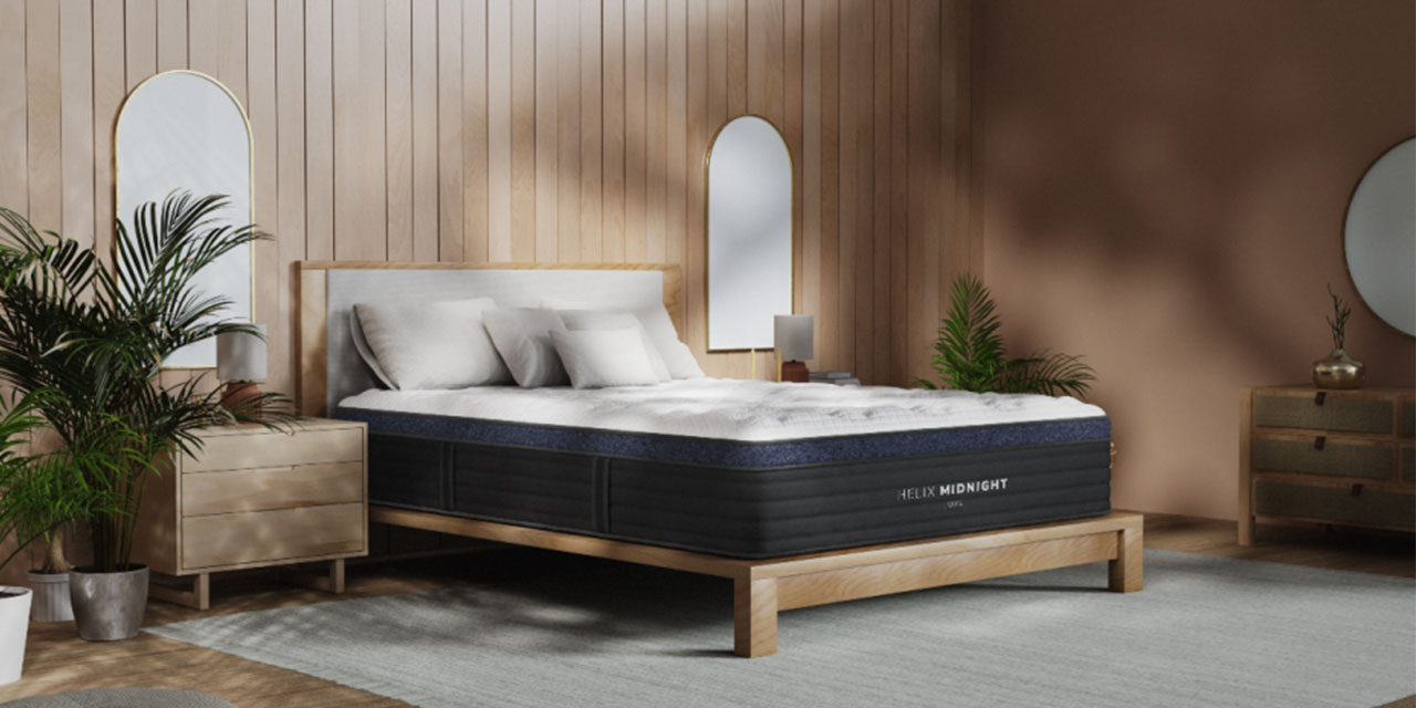 Picture of a new mattress in a bedroom. 