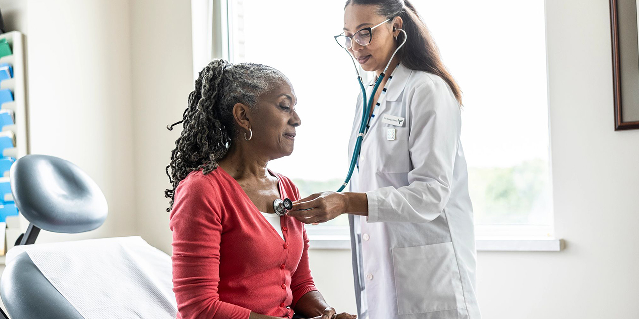Patient with their doctor.