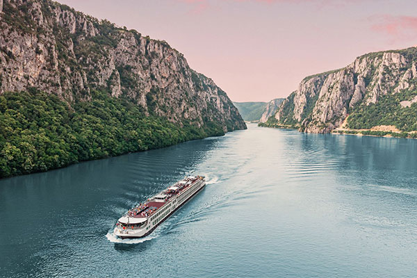 aerial view of a ship traveling through the Danube River’s Iron Gates
