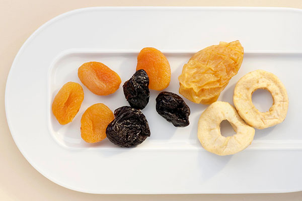 dried fruit on a white porcelain plate