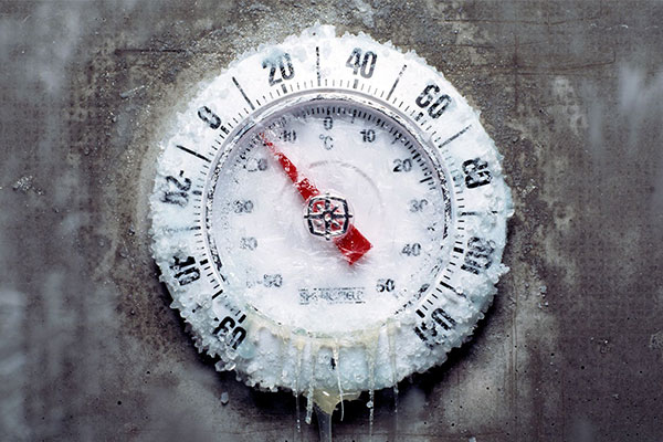 thermometer frozen in ice