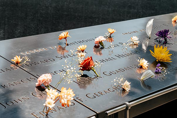 memorial wall with flowers