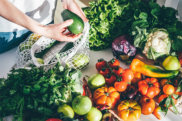 Variety of fresh vegetables on countertop