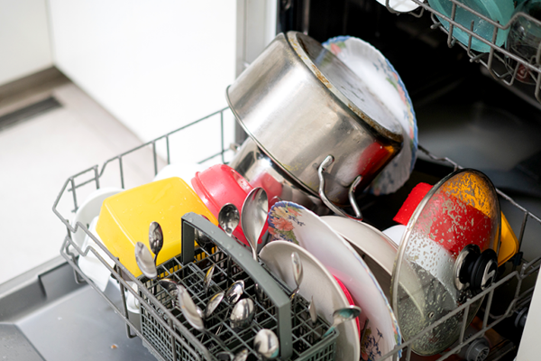 Dishwasher full of dishes.