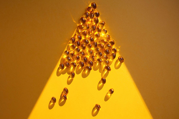 Vitamins arranged in a pyramid.