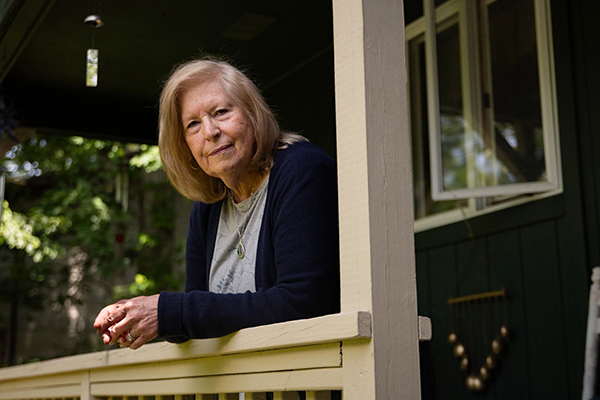 Karen Heidel on porch.