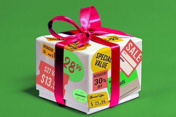 Gift box covered in stickers for sales.