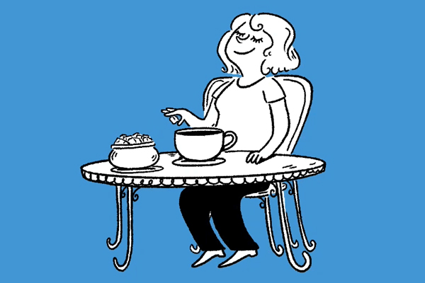 Person adding sugar to coffee.