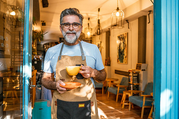 Barista enjoying a cup of coffee.