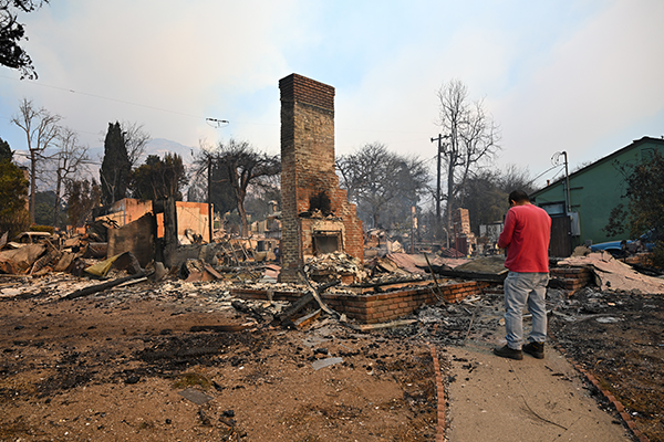 Person assessing damage.