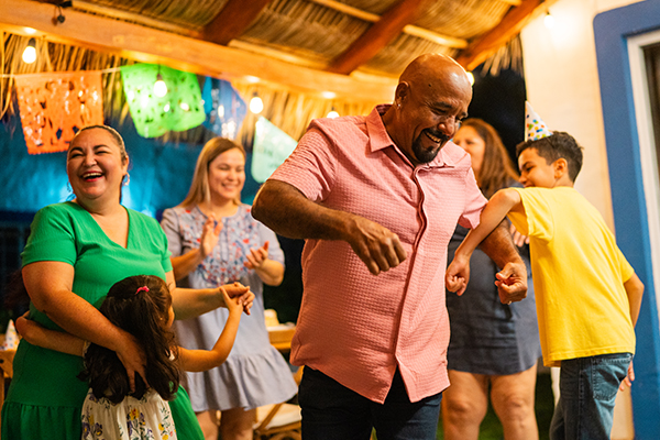 Happy family dancing.