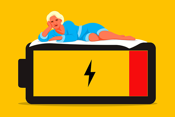 Person lying on top of a large empty battery.
