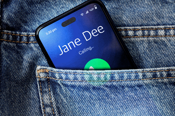 Smartphone in a pocket making an outgoing call.