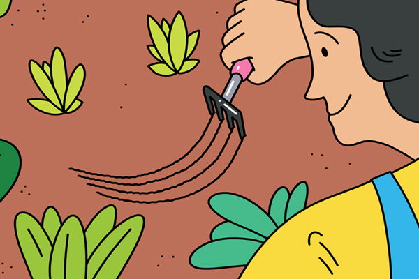 Person tilling soil.