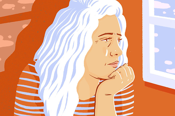 Woman looking out a window.