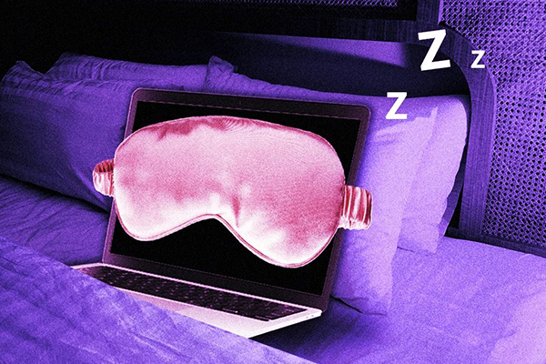 Sleep mask on a laptop computer.