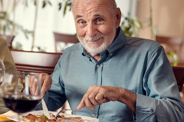 Person enjoying a meal.