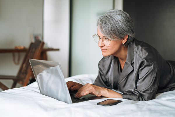 Person using a laptop computer.