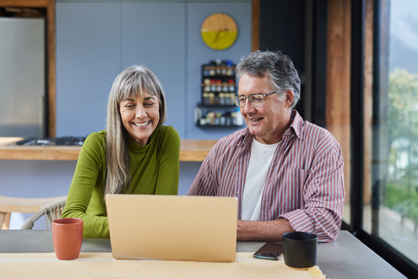 People using a laptop.