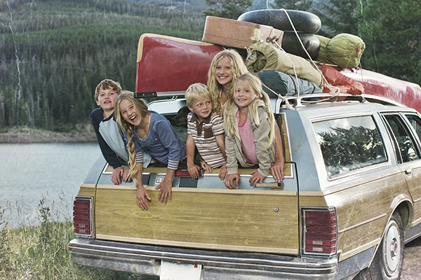 Happy family in a car.