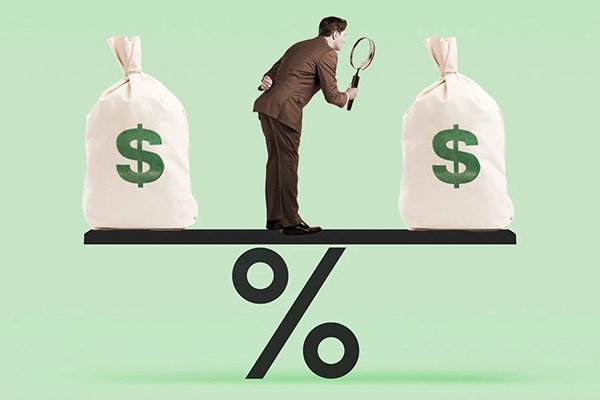 Person inspecting bags of money.