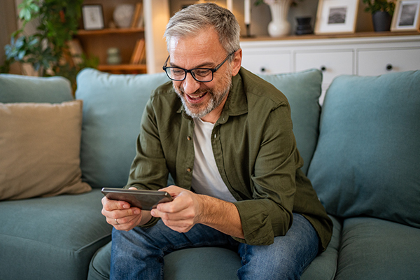 Person gaming on a smartphone.