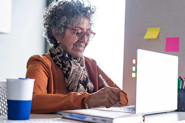 Person using laptop.