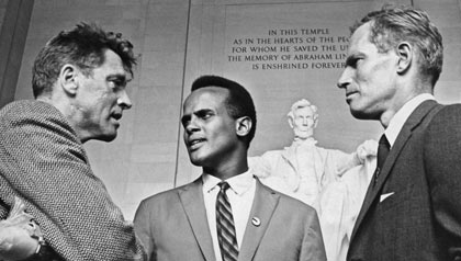 Harry Belafonte, Charlton Heston and Burt Lancaster stand in front of the Lincoln Memorial 