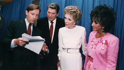 Elizabeth Taylor and the Reagans prepare for a speech about AIDS research